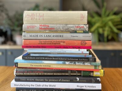 A stack of books about mill buildings.
